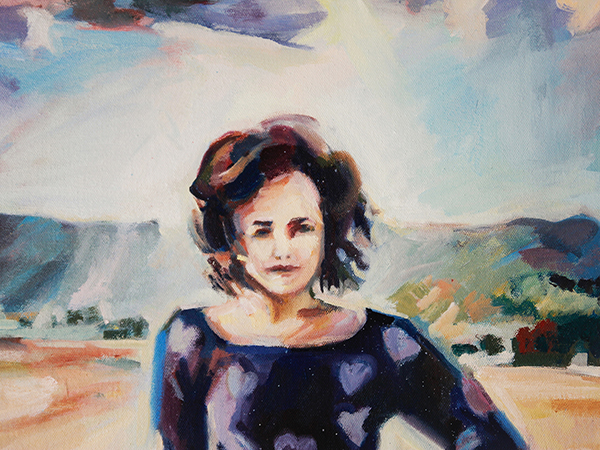 Quirk wears navy sweater with hearts